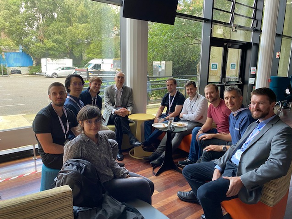 The ETH and AMD teams met at FPL'22 to plan HACC's next steps. From left to right: Monica Chiosa, Dario Korolija, Zhenhao He, Javier Moya, Gustavo Alonso, Ken O’Brien, Mario Ruiz, Marius Meyer, Thomas Preußer, and Cathal McCabe.